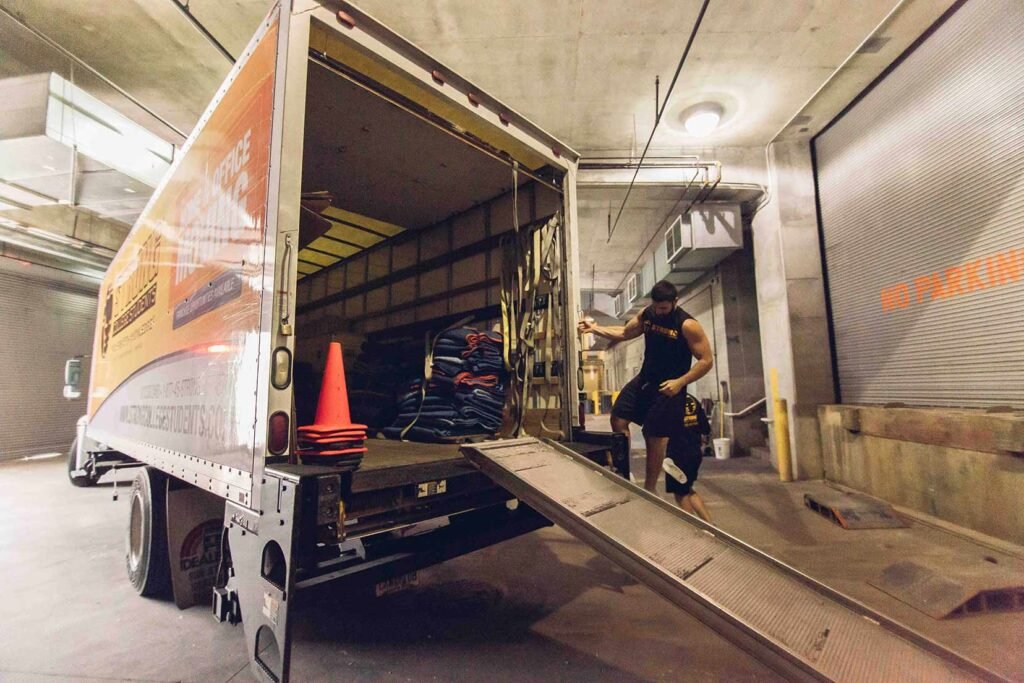 Student movers Tampa helping businesses to move office items.